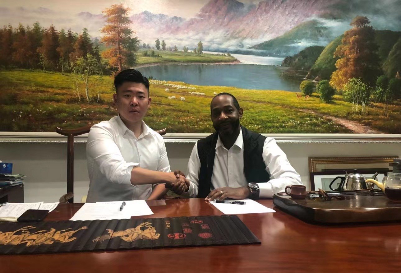 Partnership handshake representing the formation of an early Nuairs collaboration